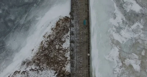 Pan up of frozen pier Stock Footage 72506372