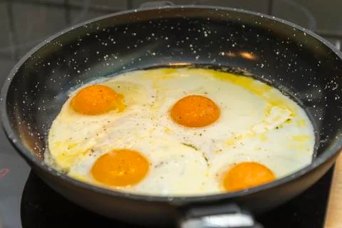 Pan full of eggs Stock Photos