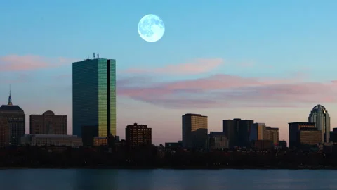 Pan of full moon rising over Boston, Massachusetts, United States, exclusive  Video stock 171414650
