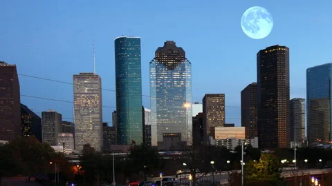Pan of full moon rising over Houston, Texas, United States, exclusive timelap Stock Footage 171415751