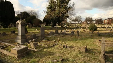 Pan onto grave yard Stock Footage 47292130