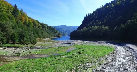 Pan of green mountains covered with trees Stock Footage 90720032