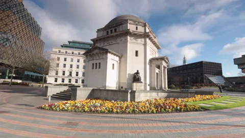 Pan from Hall of Memory to Library of Birmingham Stock Footage 134471919