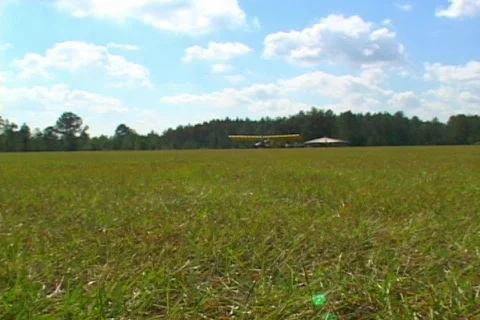 Pan of Hang Glider Being Pulled Into Flight Stock Footage 141463