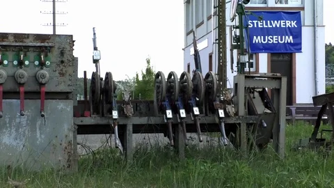 Pan: Historic mechanical lever outside a signal box museum in rural Germany Video stock 89306320