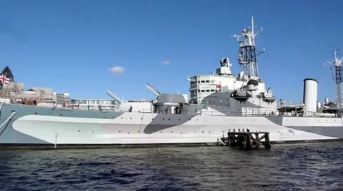 Pan of HMS Belfast on the river Thames in London Video stock 50492213