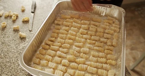 Pan with homemade gnocchi Stock Footage 129065090