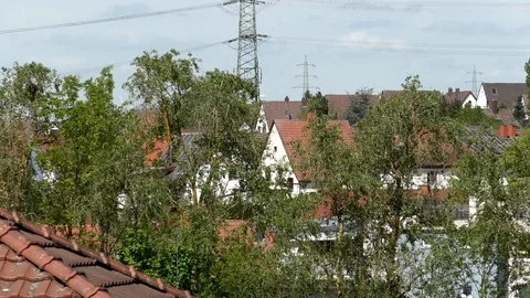 Pan: homes with tiled roofs, trees, small village Otterbach, rural Germany Stock Footage 89006798
