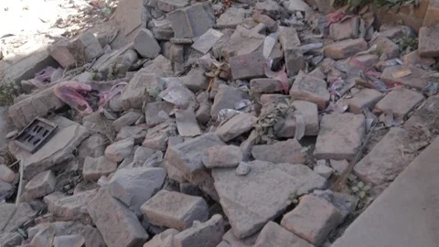 Pan of House in Rubble in Nepal Stock Footage 73273383