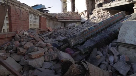 Pan of House in Rubble in Nepal Stock Footage 73273394