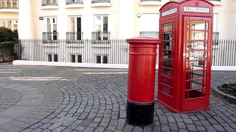 A pan of an Iconic Red Post Box and Red  Phone Box, London United kingdom Video stock 47209537