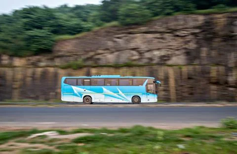 Pan image with blur background of of a speeding MSRTC AC Scania bus , speedin Stock-Fotos