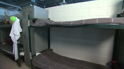 Pan Up  Inside Jail Bunkers (women's jail) Stock Footage 37910813