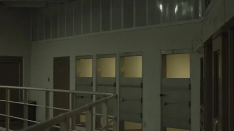 Pan of jail cell block Stock Footage 44889817