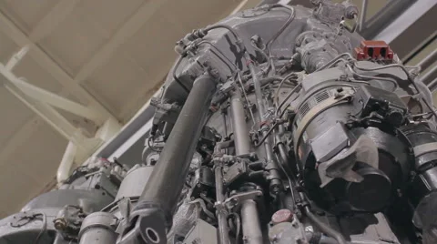 Pan to jet engine repair Stock Footage 57736345
