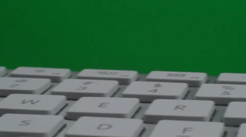 Pan Of A Keyboard On A Green Screen, Chroma, Key, Close Up Vídeo Stock 37150911