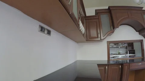 A pan kitchen cabinet view from the corner Stock Footage 97208327