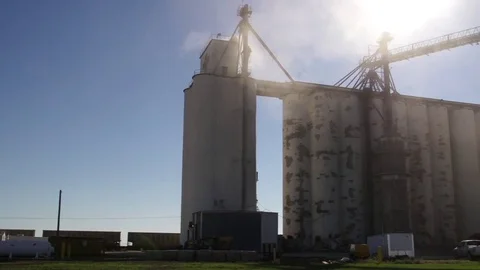 Pan (l-r) of Concrete Grain Elevator Stock Footage 73024176
