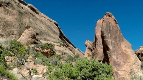 Pan to Landscape Arch in Arches NP: Narrow Video stock 79576683