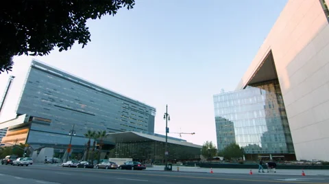Pan to LAPD headquarters with traffic passing in Downtown LA 4K Video stock 62256522