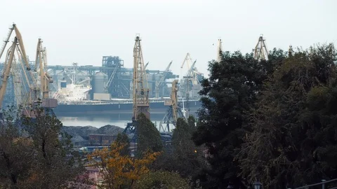 Pan to Large Cargo ship in Odessa Ukraine port at dawn on foggy morning 스톡 동영상 122536728