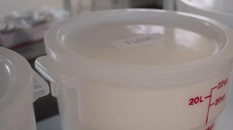 Pan of large clear white bins holding sugar and flour 스톡 동영상 60719112