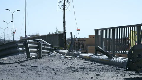 Pan left and right on Fallujah's municipality building, center of Fallujah, Iraq Stock-Footage 149948730