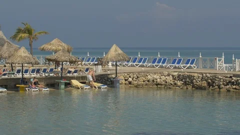 Pan left of a beach in Jamaica Stock Footage 87870145