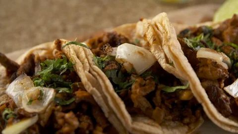 Pan left of chicken tacos  Stock Footage 112576159