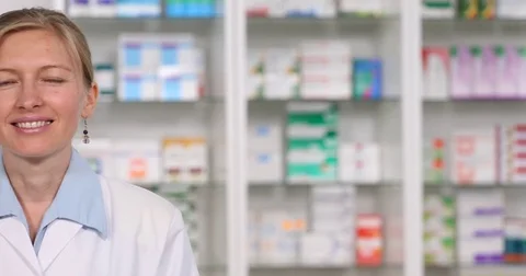 Pan Left Close Up Attractive Happy Doctor Woman Looking Camera OK Sign Drugstore Stock Footage 72786390