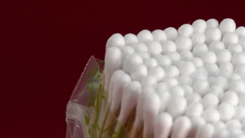 Pan Left Closeup of Cotton Swabs Packed Together Showing Soft White Cotton Tips Stock Footage 340804336