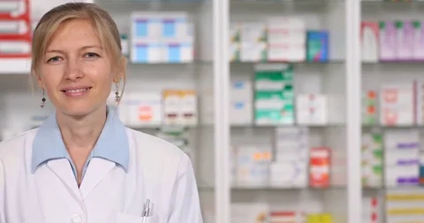 Pan Left Closeup Happy Pharmacist Woman Looking Camera Speaking Question Answer Stock Footage 72775968