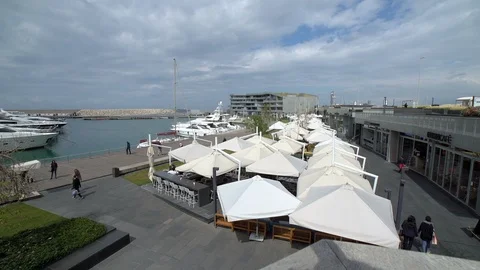 Pan left on coffee shops and Yacht Club at Zaitunay Bay, Beirut, Lebanon Stock Footage 119069072