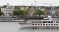 Pan Left Cruise Ship Tour Boat Passing Cologne Skyline Old Town Rhine River Day HD Footage