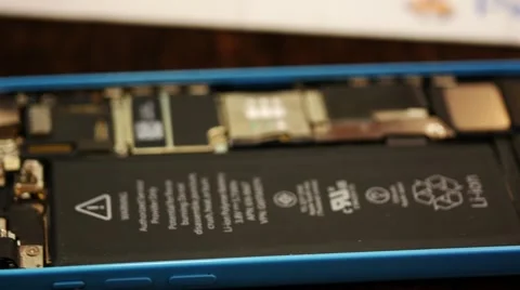 Pan left, disassembled smartphone, broken, reapair Stock Footage 60697024