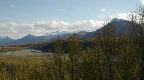 Pan Left, Fall Colors, Trees, Grass, River, Distant Mountains Stock Footage 38087416