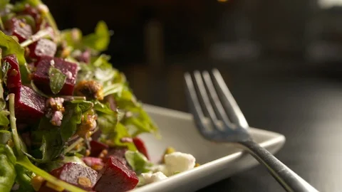 Pan left of fork with salad  動画素材 112575861