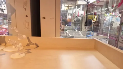 Pan Left Inside Japanese Arcade Claw Machine Hall in Osaka, Japan Stock Footage 337909103
