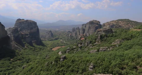 Pan left motion of Meteora Monasteries on top of rock , Thessaly, Greece, Europe Stock Footage 313385462