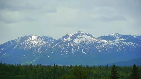 Pan Left, Mountain Range With Lush Forest Foreground Stock Footage 37379224