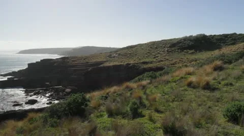 Pan left of ocean &amp; lighthouse Green Cape NSW Australia 動画素材 11180477