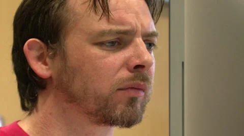 Pan left to an Office Worker Looking at a Computer Monitor Stock Footage 58241827