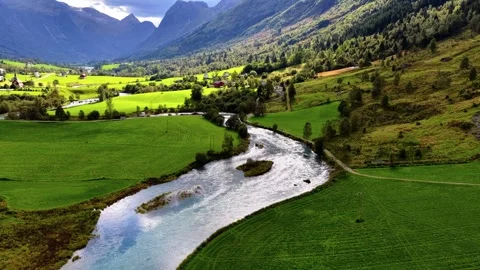 Pan left over River Olden Oldelva Laukifossen Norway Vídeo Stock 329925042