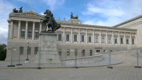 Pan from left to right across Austrian parliament building in Vienna Stock Footage 82425568