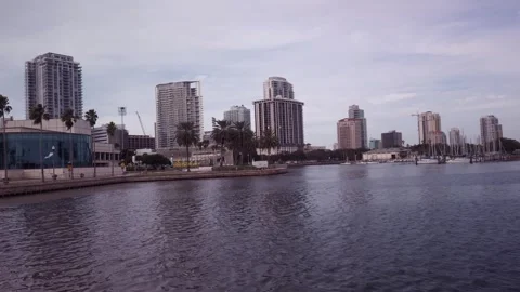 Pan left to right from Albert Whitted Park looking north towards downtown Stock Footage 259311561