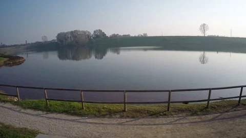 Pan (left to right) around the lake promenade, Italy Stock-Footage 71465840
