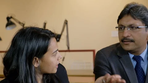 Pan left to right as seniors and juniors who are attentive and listen to solutio Stock Footage 102081853