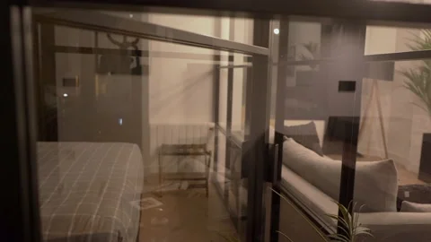 Pan left to right shot of Modern Luxury Living Room and Bedroom Stock Footage 153313178