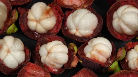 Pan Left To Right Texture Of Many Opened Mangosteen Fruits 스톡 동영상 336228894