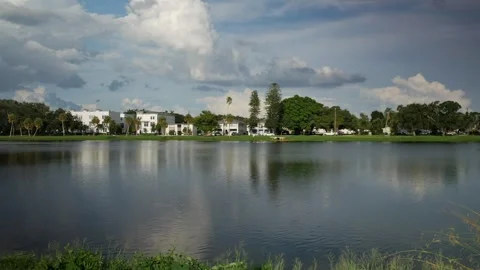 Pan left to right Wide shot Looking  east over Crescent Lake park in St. petersb Stock Footage 282684858